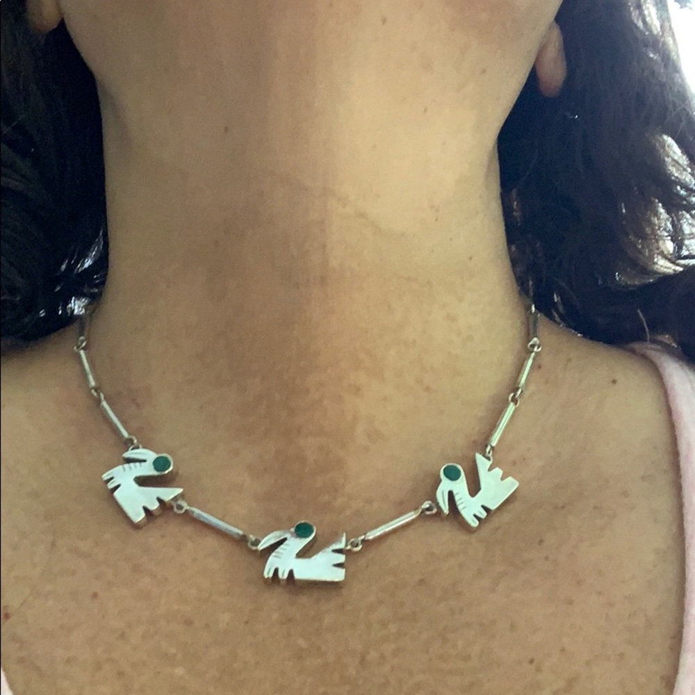 Beautiful and unique Sterling Silver necklace.